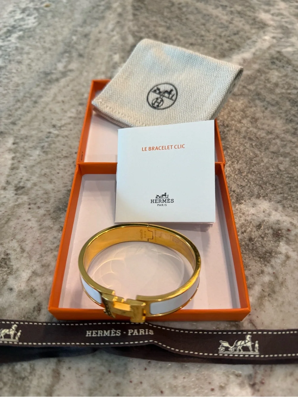 Hermès Clic H Gold and White Enamel Bracelet